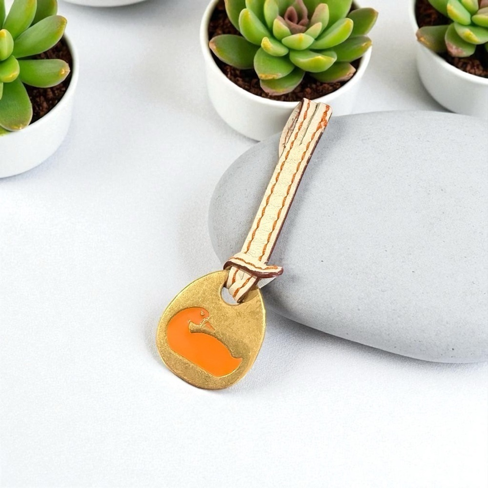 Dooney & Bourke DB Gold and Orange Keychain with Duck Design Authentic designer